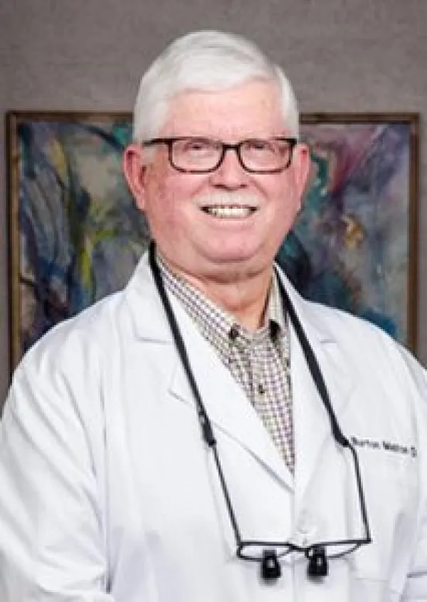 A. Burton Melton, DDS